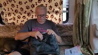 Burt Opens an American Thrift Supply Purse Box