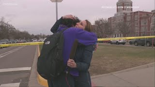 Reporter reunites with son during live report after Denver school shooting