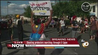 Protesters march through El Cajon after police shooting