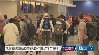 Snowstorm causes flight delays in Grand Rapids amid busy Thanksgiving travel period