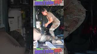 Air Force Airmen prepare to load a MAFFS System into a C-130 Hercules