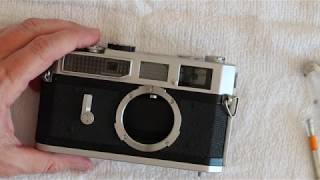 How to fix a stuck or lagging shutter on a Canon 7 or Canon P camera