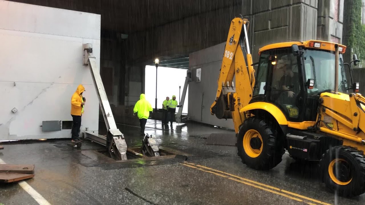 Video Now: Street gates being closed near the Hurricane Barrier