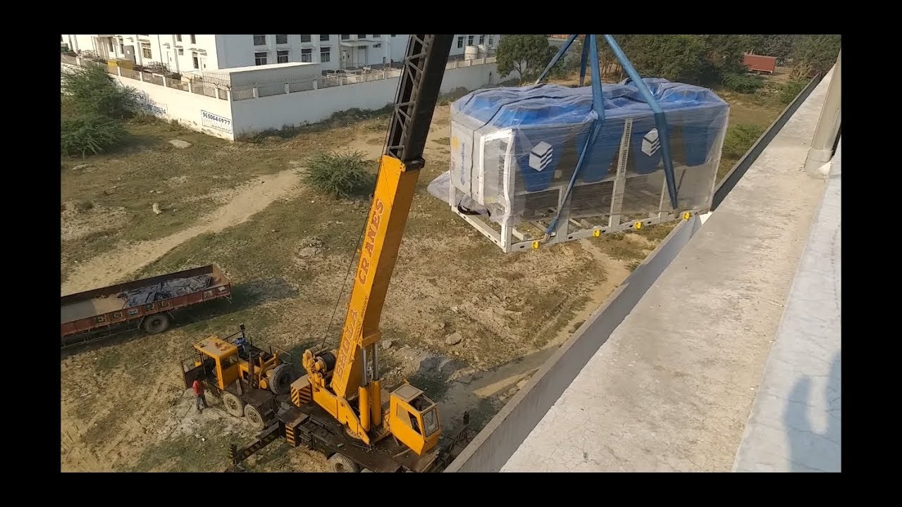 120 TR Air Cooled Chiller lifting to terrace by 50 Ton long boom crane