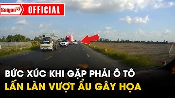 Tài xế bức xúc khi gặp phải ô tô lấn làn vượt ẩu gây họa xong bỏ chạy | Tin tức SaigonTV