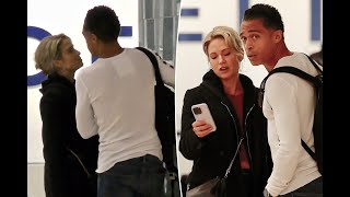 Amy Robach, T.J. Holmes cozy up during holiday travels amid affair scandal