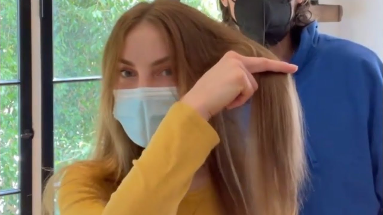 Donovan dances before he cuts her hair into chin length Bob