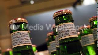 Close up for many bottle necks standing in the bar, soft drinks and party concept. Frame. Glass screenshot 1