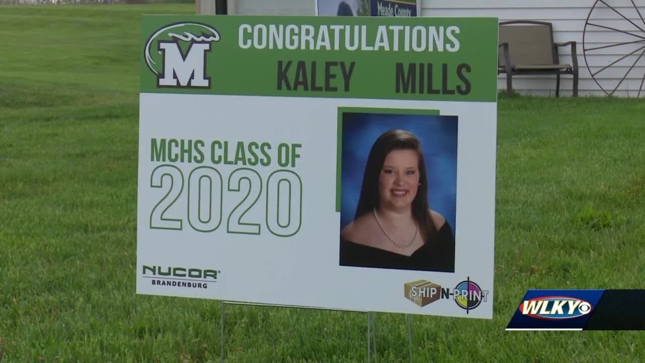 Meade County staff delivers personalized yard signs to Class of 2020