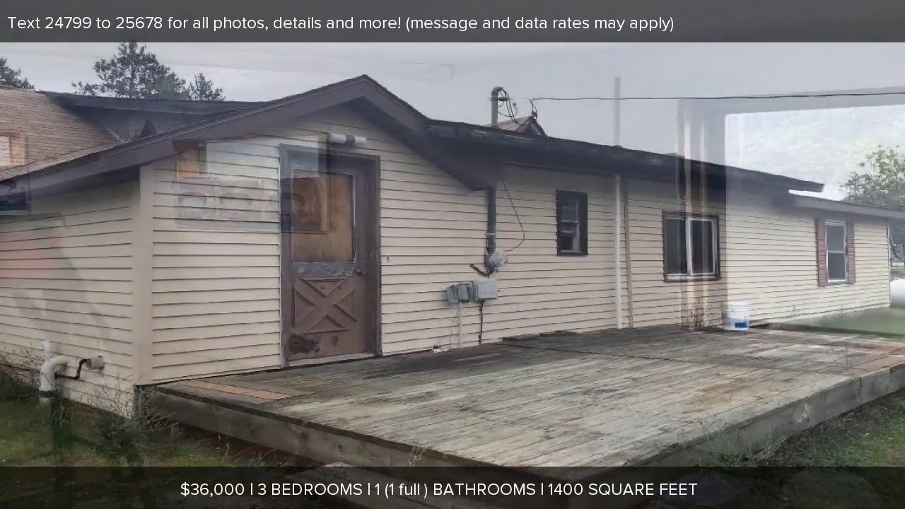 1906 E MICHIGAN HIGHWAY, Roscommon, MI Presented by Bonnie Odell.