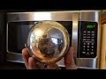 Making a Polished Aluminum Foil Ball in a Microwave. Microwaving aluminium.