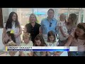 Group of young ladies use lemonade stand to raise money for local children's hospital