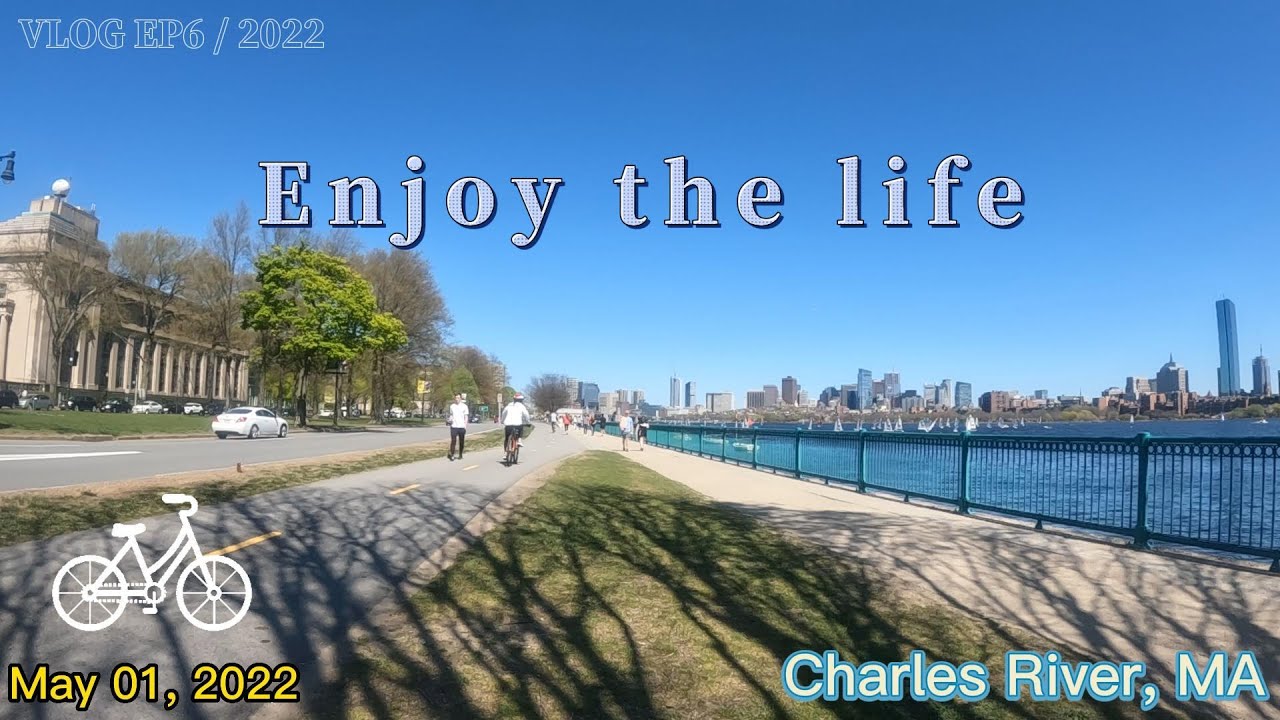 Biking, street view along Charles River, Boston, Cambridge MA [