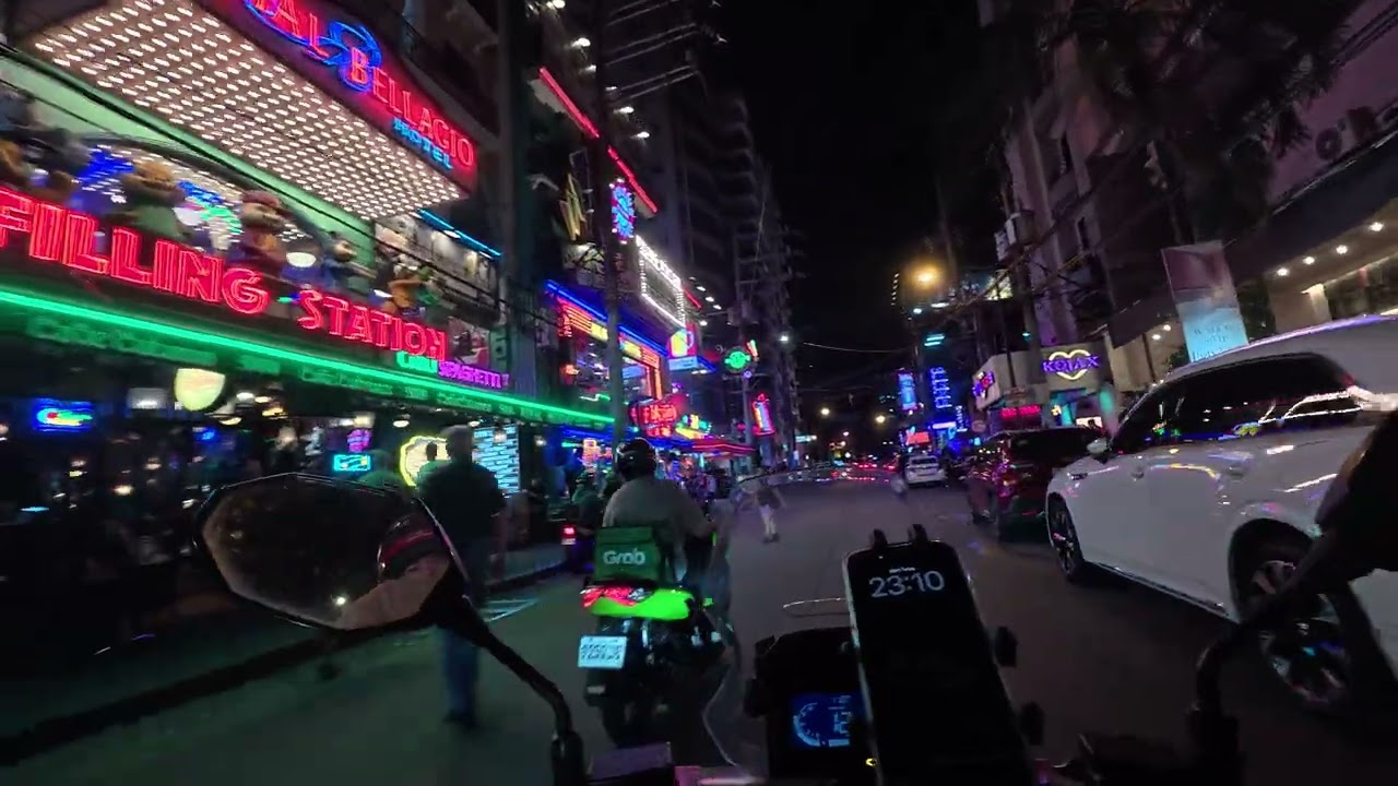 P. Bugos Makati nightlife riding scooter 