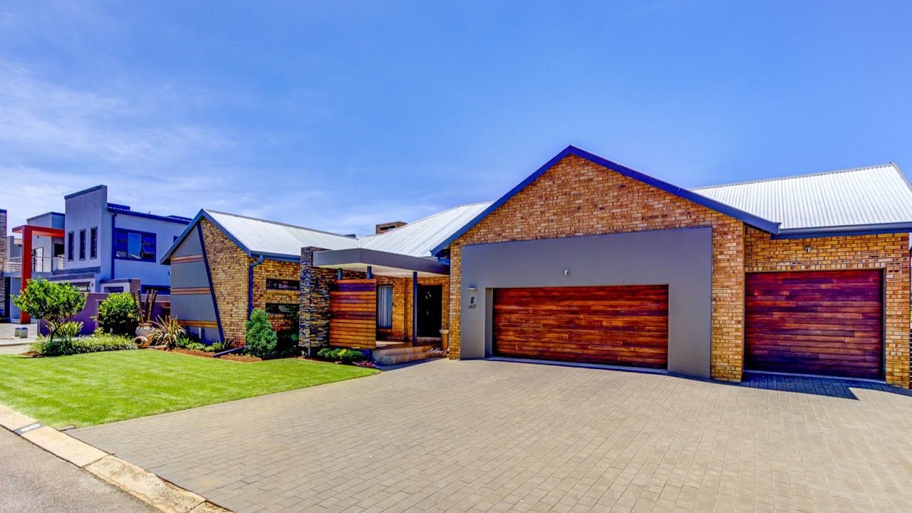ABSOLUTELY STUNNING FULL TITLE HOME IN GLEN EAGLE SECURITY ESTATE