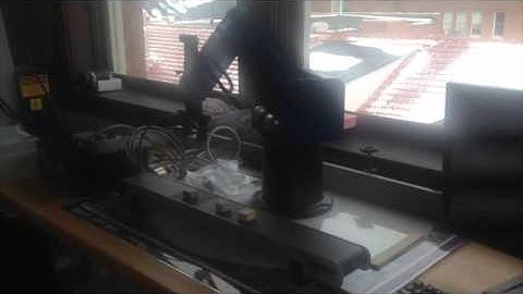 Simple simulation of Scorbot and conveyer belt for Modern Manufacturing