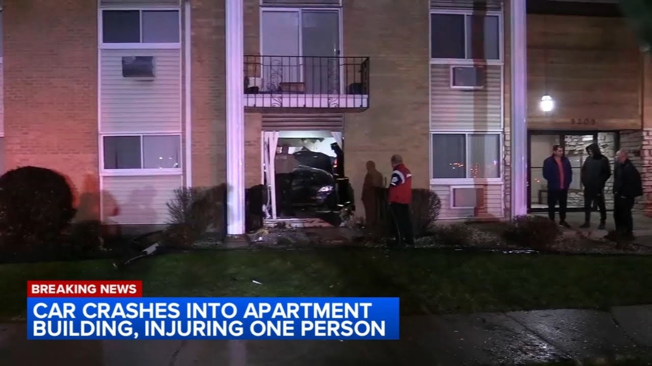 1 injured when car crashes into suburban apartment building - YouTube