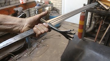 Forging a pattern welded Basilisk sword, part 3, forging the guard.