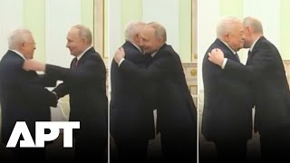 Rare Kremlin Moment Putin Welcomes Palestines Abbas With Arabstyle Hug  Apt