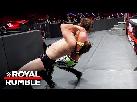 AJ Styles drives Daniel Bryan into the arena floor with a punishing reverse DDT: Royal Rumble 2019