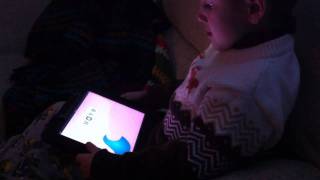 Finn plays with his new iPad