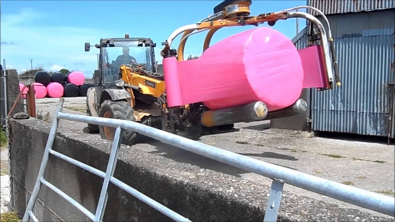 JCB TM310 Agri - Wrapping and Stacking Bales [HD]