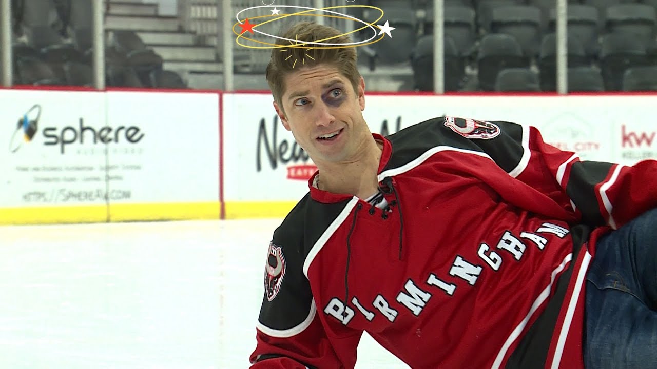 Bulls' Kasey Kulczycki teaches Kyle Burger the art of the hockey fight