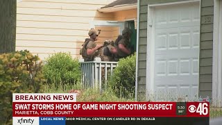 SWAT storms home of game night shooting suspect screenshot 1