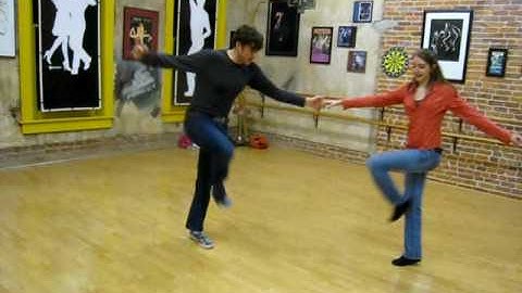 lindy hop,  jump over styling, crank turn with leader