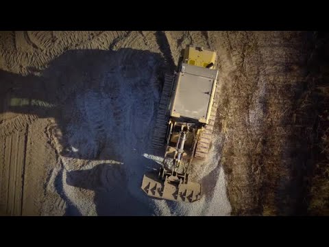 Cat® 953 Track Loader Hauling Gravel