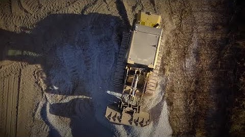 Cat® 953 Track Loader Hauling Gravel