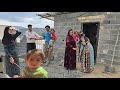 Professor nowruz and his family in helping to build khosrows house