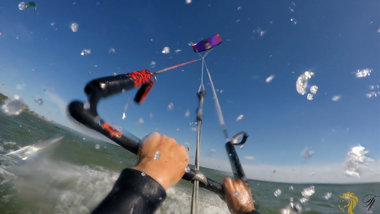 Man in the air and Poseidon is watching 4K Kiteboarding movie YouTube