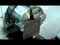 dialing work off center in a lathe using a 4-jaw chuck