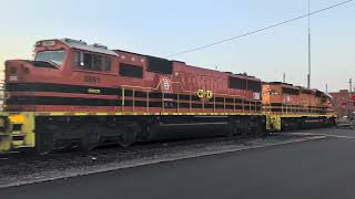 A SD40-2 and a SD60M are hauling an OC manifest train.