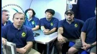 collectSPACE Interview: NASAs NEEMO XV aquanaut crew
Presented by http://collectSPACE.com The Source for Space History and Artifacts.
NEEMO XV (15) is the first of NASAs undersea missions to simulate a visit to an asteroid. On Oct. 24, 2011, collectSPACE.com editor Robert Pearlman spoke with the NEEMO XV crew live from the Aquarius Underwater Laboratory near Key Largo, Fla.
NASA astronaut and former International Space Station (ISS) crew member Shannon Walker leads the NEEMO XV crew, which includes JAXA astronaut Takuya Onishi and Canadian Space Agency astronaut David Saint-Jacques.
Rounding out the crew is Steven Squyres of Cornell University, James Talacek and Nate Bender of the University of North Carolina, Wilmington. Squyres is the scientific principal investigator for the Mars Exploration Rover Project. Talacek and Bender are professional aquanauts.
Read more: http://www.collectspace.com//neemoxv
Credit: collectSPACE.com/NASA TV collectSPACE Interview: NASAs NEEMO XV aquanaut crew