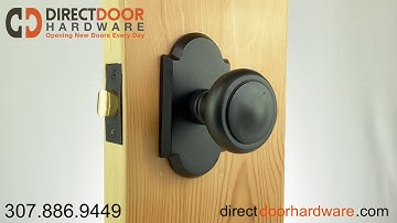 Emtek Butte Sandcast Door Knob with Style 1 Rosette in Flat Black