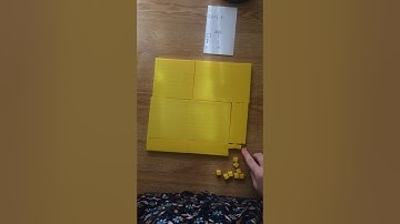 Multiplying decimals using base ten blocks