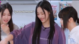 Minji being a mom to NewJeans for 5 minutes straight