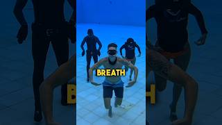 Freedivers Walk Together (Underwater While Holding Their Breath)