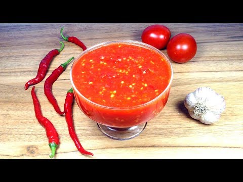 Video: Adjika de tomate y ajo - receta sin cocinar