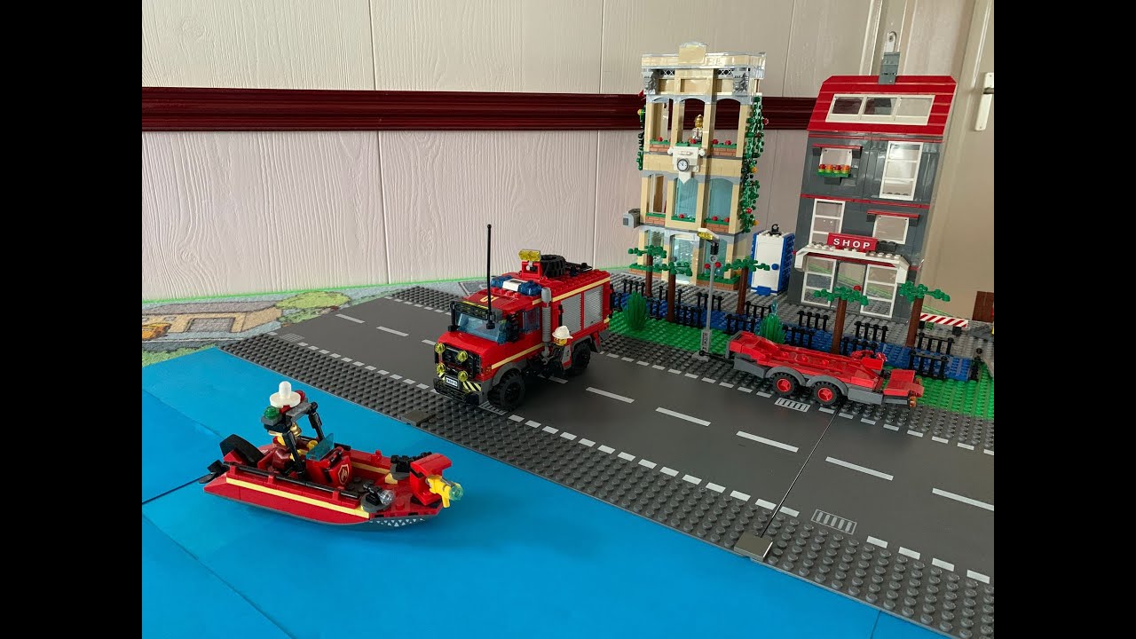lego moc Mercedes fire dept unimog with boat and trailer!