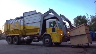 Mid-State Solid Waste - 1997 Peterbilt Amrep Octo Front Loader
Here we revisit Mid-State Solid Waste, a small locally owned company based out of Templeton in the north county. Many of you may remember seeing the CWS Square Body FL I filmed from them last summer, and in this video I present what I assume to be their spare front loader, a 1997 Peterbilt 320 with an old school Amrep front load body.
After a second failed attempt to film their WhiteGMC split rapid rail, it was almost a wasted trip until I heard this truck start up as I was waiting by the yard. There are many quirks and interesting details about this truck that make it far more unique than your average Amrep Octo FL. First and likely most noticeable is the rare drop down tailgate, something Ive only ever seen in photos. Im unsure about what the specific purpose of this design is besides more yardage, so maybe someone else out there knows more than I do. Another feature of this truck is the underbody arm hydraulics, an iconic manufacturing spec to most front load trucks of the era. You will also notice that this cab is in fact a RHS low entry, which leads me to believe that this was possibly used for manual collection before Mid State went entirely automated... but due to the lack of history or knowledge about the company or service area it is hard to say if this was the case. Lastly, one of the smaller features I like about this truck are the chromed Budd steel wheels... another thing unique to Mid-State’s older trucks.
Anyhow, it was definitely cool seeing this truck, along with a skilled operator behind the wheel, tackling this commercial route! Huge thanks to the driver for letting me follow along and grab some video. Mid-State Solid Waste - 1997 Peterbilt Amrep Octo Front Loader