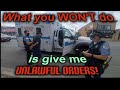 COP BELIEVES HE CAN CLEAR THE SIDEWALK AT A TRAFFIC STOP?