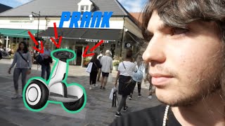 Pranking people at the mall with following robot ! *I GOT KICKED OUT AT THE END !*