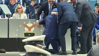 Joe Biden trips and falls at US Air Force Academy graduation ceremony