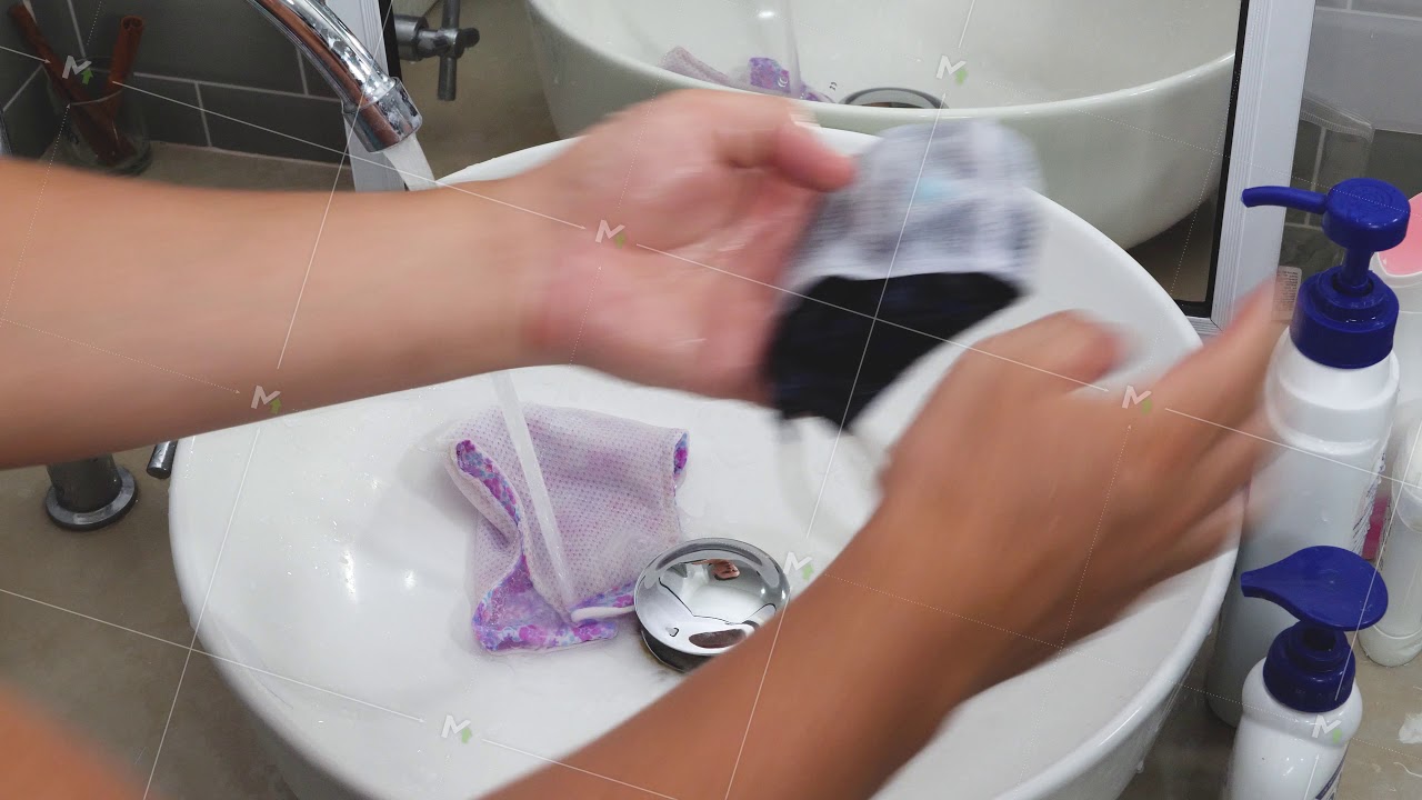 Man hands wash face mask in bathroom YouTube