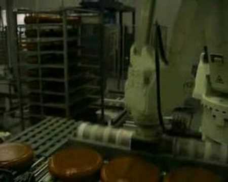 RFA Kawasaki Robotpalletiser with servo gripper palletizing cheese