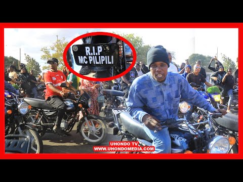 BODA BODA WAFUNGA BARABARA KUPISHA MSAFARIA WA MAGARI KUELEKEA MAKABURINI KUMZIKA MC PILIPILI