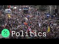 Tens of Thousands March Against Pandemic Restrictions in Berlin